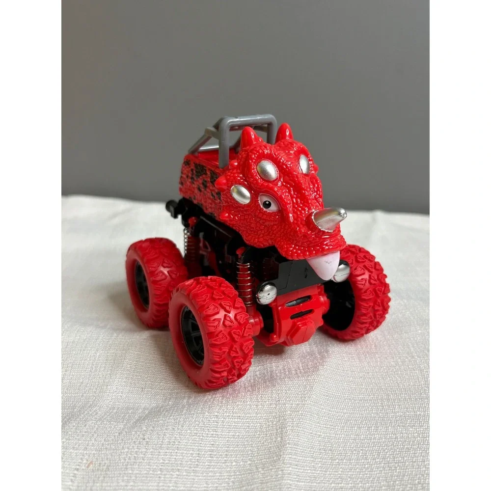 Ja-Ru Red Dinosaur Monster Truck Triceratops Friction Powered Toy 5710525